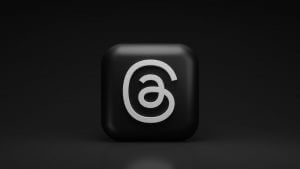 a black square with a white number six on it