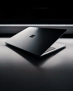 A laptop computer sitting on top of a table