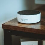 white and black round portable speaker