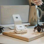 Square reader setup on a desk with a computer.
