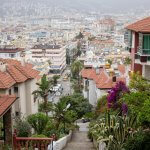 a view of a city from the top of a hill