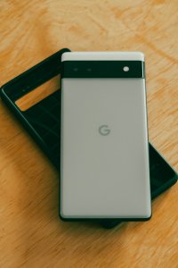 a close up of a cell phone on a table