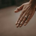 selective focus photography of person's hand
