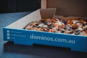 a blue box with a pizza inside of it